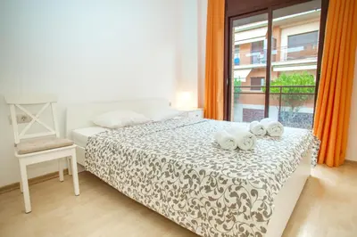 Cama o camas de una habitación en AL28 Duplex en la playa, Fenals, Costa Brava