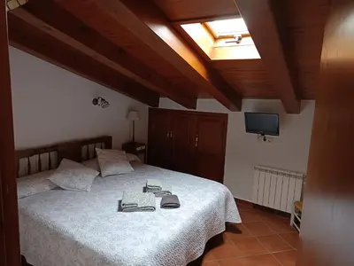 Cama o camas de una habitación en Turismo Rural Calaliu