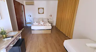 Cama o camas de una habitación en Hotel Mireia
