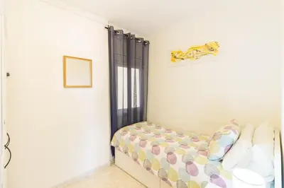 Cama o camas de una habitación en Apartment in front of the Beach