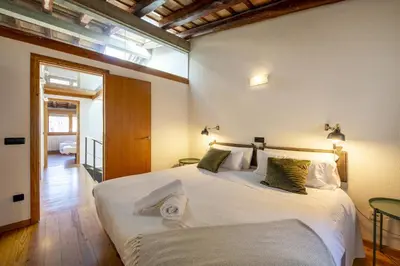Cama o camas de una habitación en Sleep & Stay Arab Baths Ático Apartment