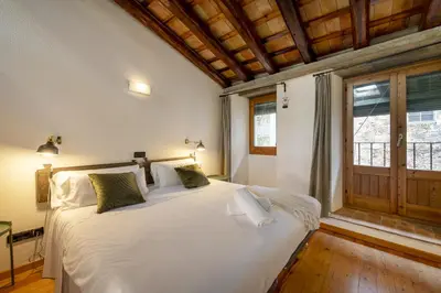Cama o camas de una habitación en Sleep & Stay Arab Baths Ático Apartment