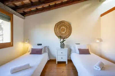 Cama o camas de una habitación en Sleep & Stay Arab Baths Ático Apartment