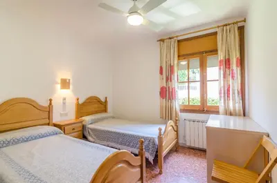 Cama o camas de una habitación en Club Villamar - Abanico