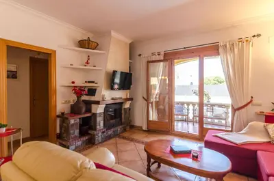 Una televisión o centro de entretenimiento en Club Villamar - Goliat