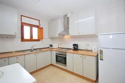 Una cocina o zona de cocina en Club Villamar - Poppy