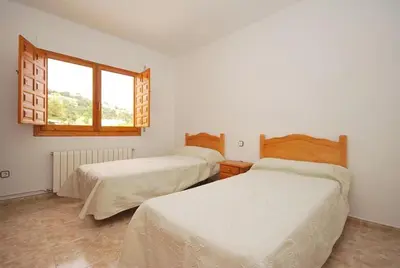 Cama o camas de una habitación en Club Villamar - Tinoco