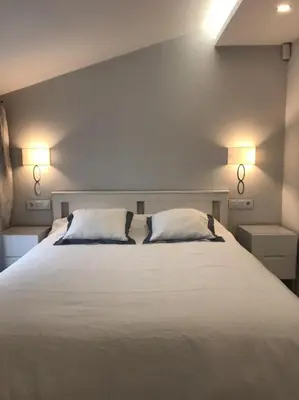Cama o camas de una habitación en Nuevo Luminoso Apartamento Catalina a 80 metros de la playa para 4 personas