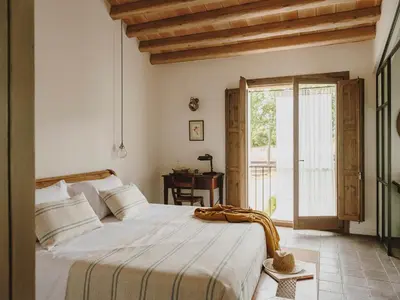 Cama o camas de una habitación en Mas Generós - Adults-Only Eco Hotel