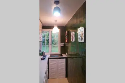 Una cocina o zona de cocina en Apartment in front of the sea