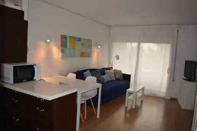 Una televisión o centro de entretenimiento en Cala Llevadó Five – Piscina, A/A y Terraza
