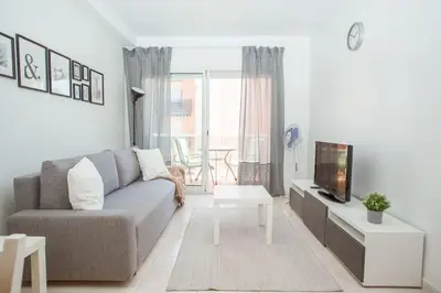 Una televisión o centro de entretenimiento en AL30 Apartamento para 4pax, Fenals, Costa Brava
