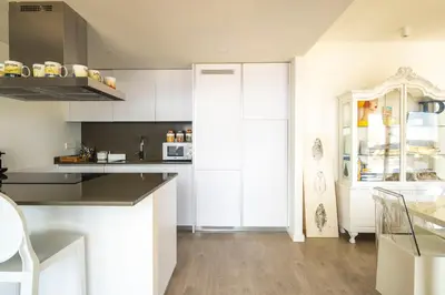 Una cocina o zona de cocina en Apartamento en Port Marina Palamos