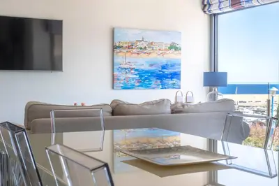 Una televisión o centro de entretenimiento en Apartamento en Port Marina Palamos
