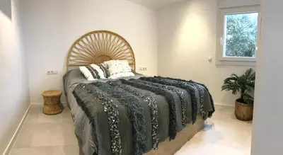 Cama o camas de una habitación en Can Estrellas apartamento vista mar