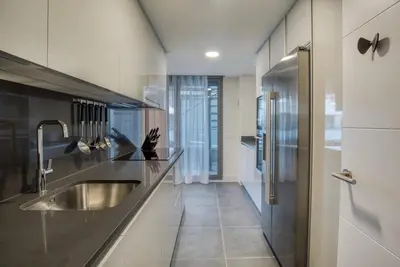 Una cocina o zona de cocina en Penthouse on the first line