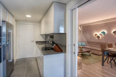 Una cocina o zona de cocina en Penthouse on the first line