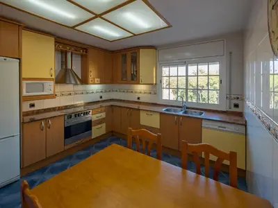 Una cocina o zona de cocina en Club Villamar - Admirada