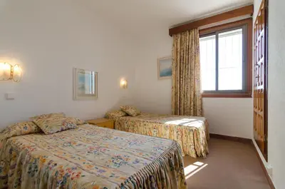 Cama o camas de una habitación en Club Villamar - Boira