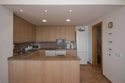 Una cocina o zona de cocina en Club Villamar - Claire