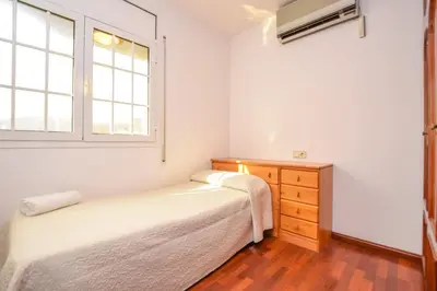 Cama o camas de una habitación en Club Villamar - Isabeleta