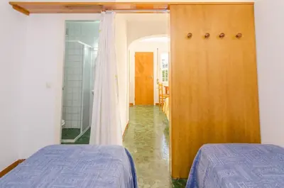 Cama o camas de una habitación en Club Villamar - Lombok