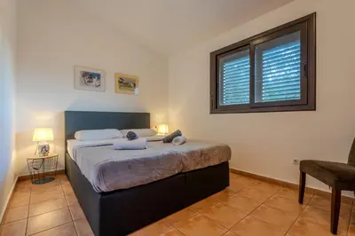 Cama o camas de una habitación en Club Villamar - Nirwana