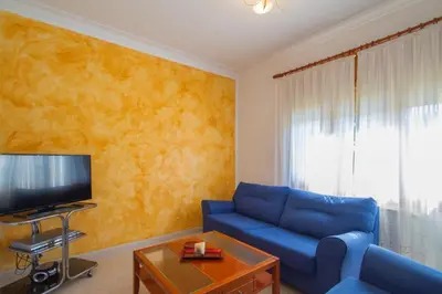 Una televisión o centro de entretenimiento en Club Villamar - Ruizman