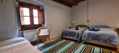 Cama o camas de una habitación en La casita marrón