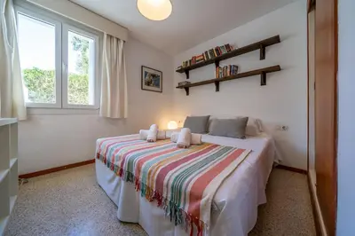 Cama o camas de una habitación en Villa Alpago Piscina Privada Vistas Mar Aire Acondicionado