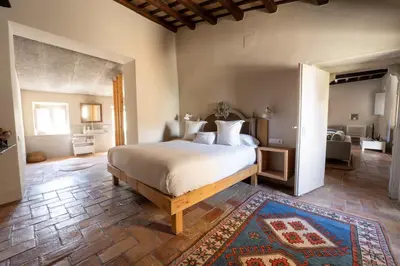 Cama o camas de una habitación en Deco - Casa Castell de Peratallada