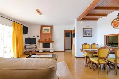 Una televisión o centro de entretenimiento en Club Villamar - Delfin