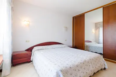 Cama o camas de una habitación en Club Villamar - Delfin