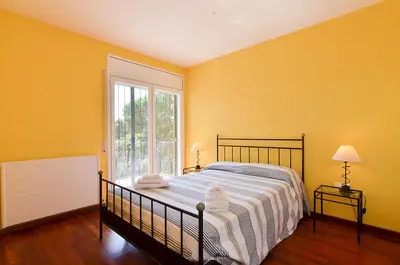 Cama o camas de una habitación en Club Villamar - Pitagoras