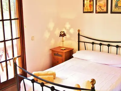 Cama o camas de una habitación en Villa in Sant Pol near Crystal Beach
