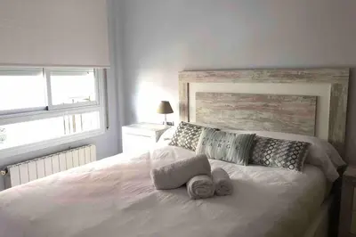 Cama o camas de una habitación en Apartamento Can CALET con PARKING en Sant Antoni de Calonge