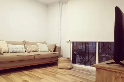 Una televisión o centro de entretenimiento en Apartamento Can CALET con PARKING en Sant Antoni de Calonge