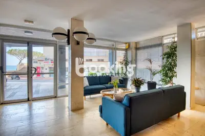 Zona de estar de Sicamar Apartament per 5 persones a primera línia de mar amb plaça d'aparcament