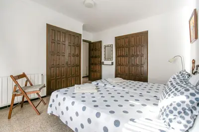 Cama o camas de una habitación en El Niu