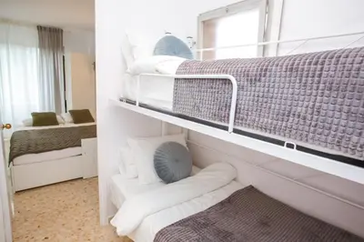 Cama o camas de una habitación en AL14 Estudio a 250 m playa Fenals, Costa Barava