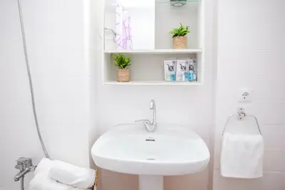 Un baño de AL14 Estudio a 250 m playa Fenals, Costa Barava