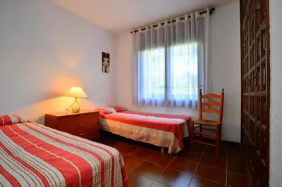 Cama o camas de una habitación en N-3 CALELLA DE PALAFRUGELL 4 PAX