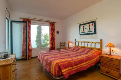 Cama o camas de una habitación en L-1 CALELLA DE PALAFRUGELL 8 PAX