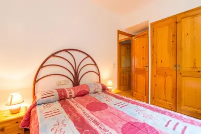 Cama o camas de una habitación en L-1 CALELLA DE PALAFRUGELL 8 PAX