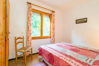 Cama o camas de una habitación en L-1 CALELLA DE PALAFRUGELL 8 PAX
