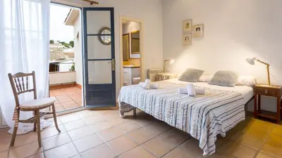 Cama o camas de una habitación en Villa Monturiol