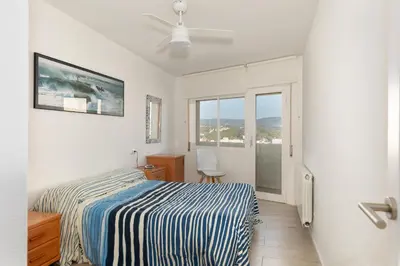 Cama o camas de una habitación en Hauzify I Apartaments SuperBeach