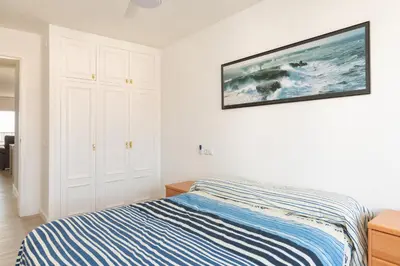 Cama o camas de una habitación en Hauzify I Apartaments SuperBeach