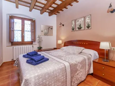 Cama o camas de una habitación en Holiday Home Mas Ambros by Interhome