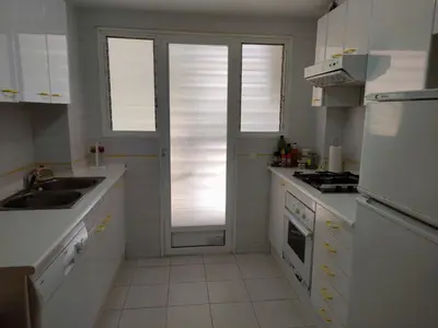 Una cocina o zona de cocina en Sol Pins II - Garrido